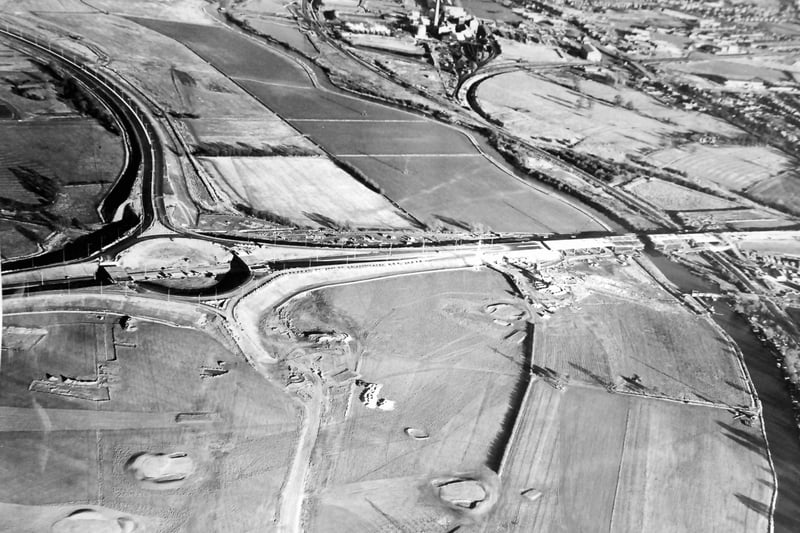 The 1970s parkway construction  across the River Nene at Thorpe Meadows alongside the site that would become the rowing lake.