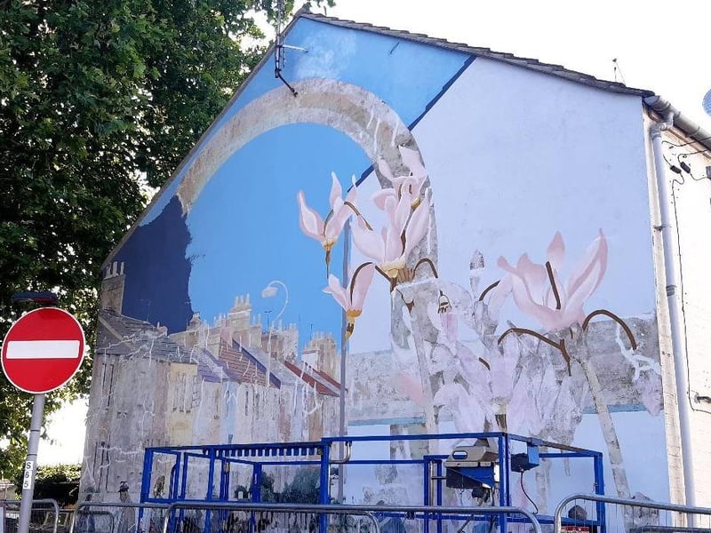 The on-going  work taking place to restore the Link Road Mural in Peterborough