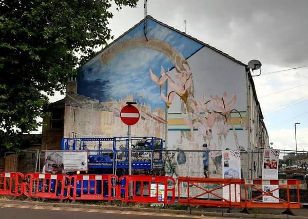 The on-going work taking place to restore the Link Road Mural in Peterborough