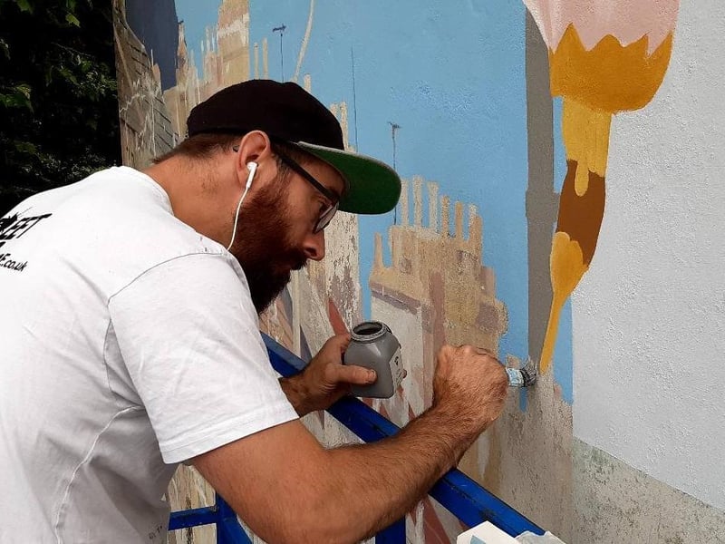 The on-going  work taking place to restore the Link Road Mural in Peterborough