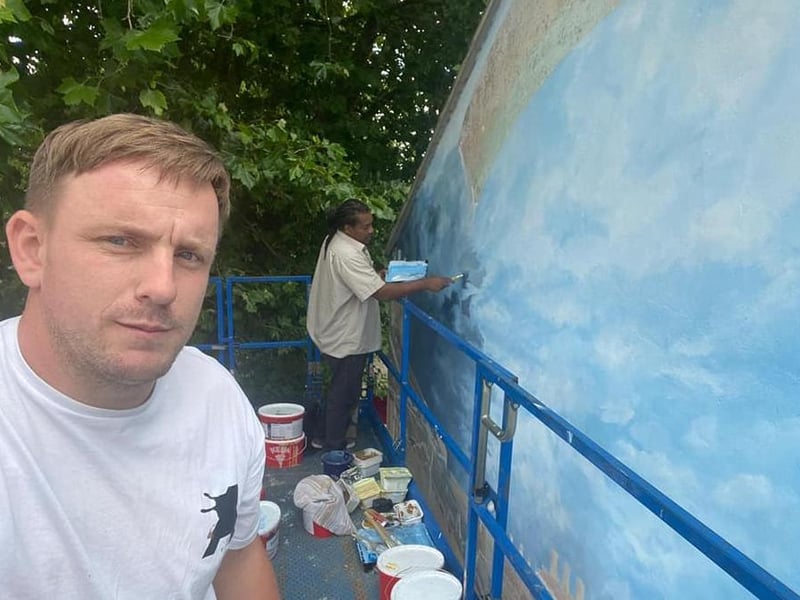 The on-going  work taking place to restore the Link Road Mural in Peterborough