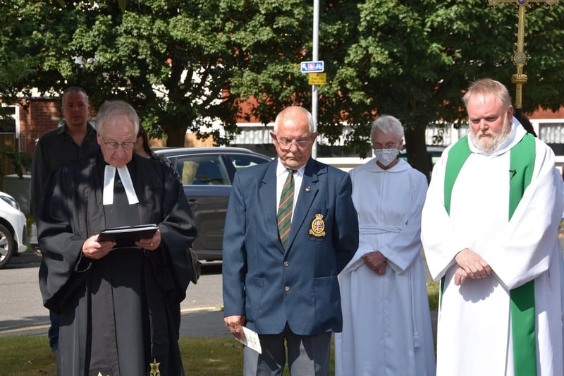 A Burma Star poem was read by their chaplain the Rev Ian Banks (left) during a VJ Day ceremony led by the Rev Richard Holden (right).