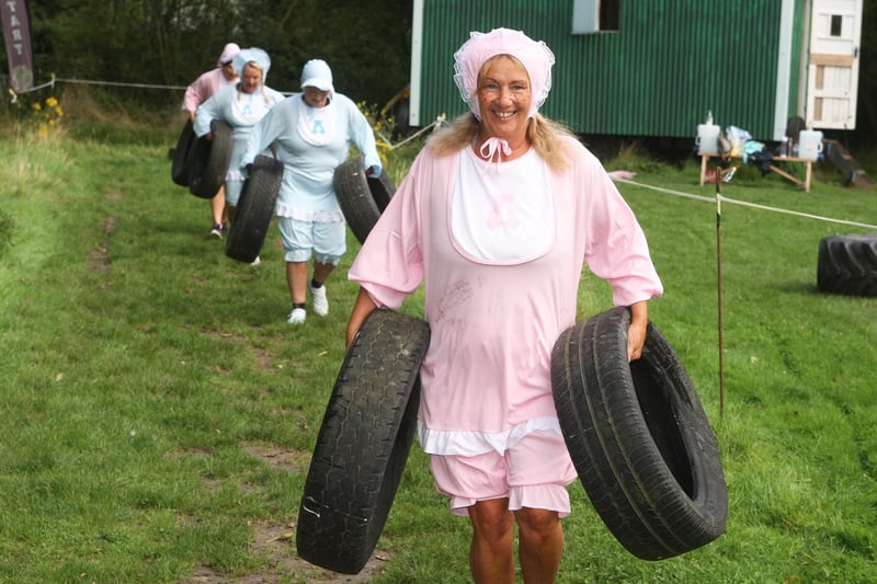Ladies doing an assault course dressed as babies to raise money for Southampton neonatal unit. Photo by Derek Martin Photography.