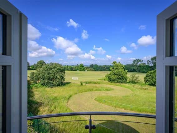 The property is close to the town centre but offers views over playing fields.