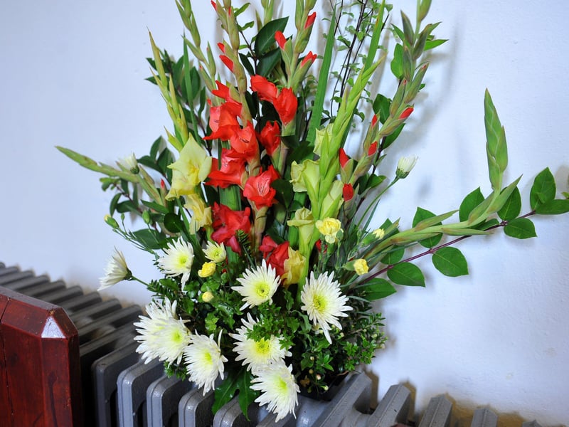 Flower festival displays for the celebration week at St Mary's Church in Sompting, including knitted mice made by verger Jacqui Offord. Picture: Steve Robards SR2108172