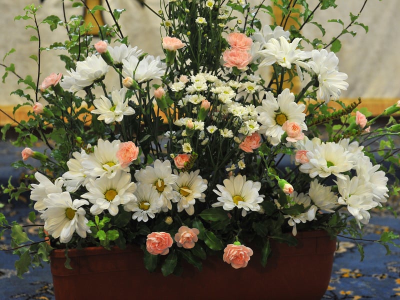 Flower festival displays for the celebration week at St Mary's Church in Sompting, including knitted mice made by verger Jacqui Offord. Picture: Steve Robards SR2108172