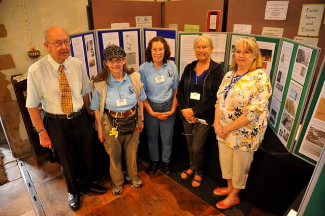 Volunteers ready to welcome visitors to St Mary's Church in Sompting for the flower festival and history exhibition. Picture: Steve Robards SR2108173
