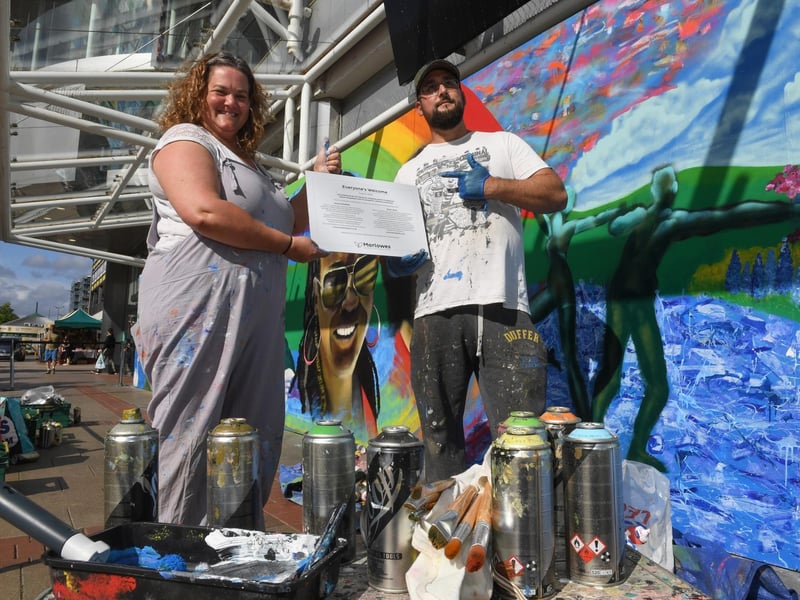 Anna Schofield and Mark Tanti created the unique hand drawn/painted mural