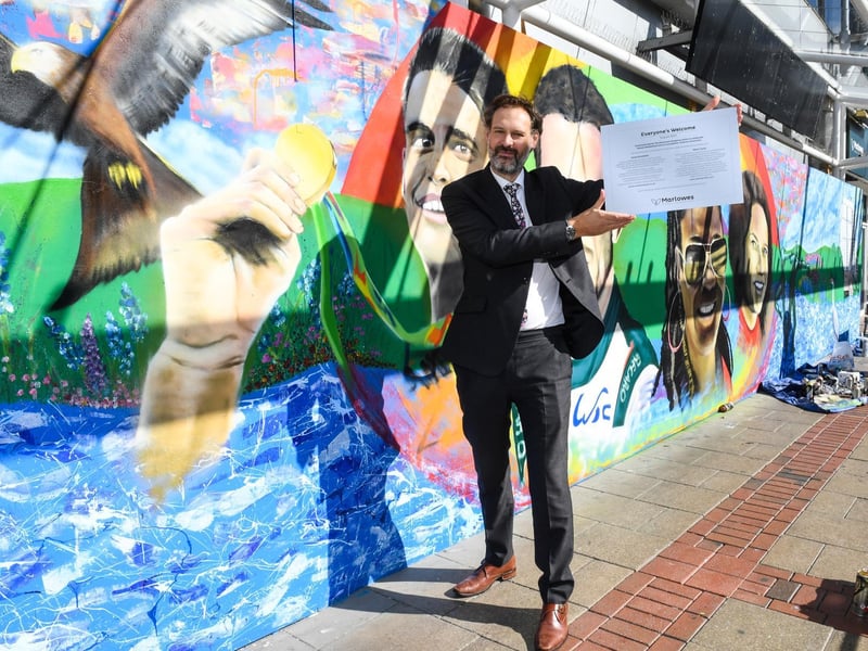 The mural has been painted directly onto the hoarding with acrylic and spray paint
