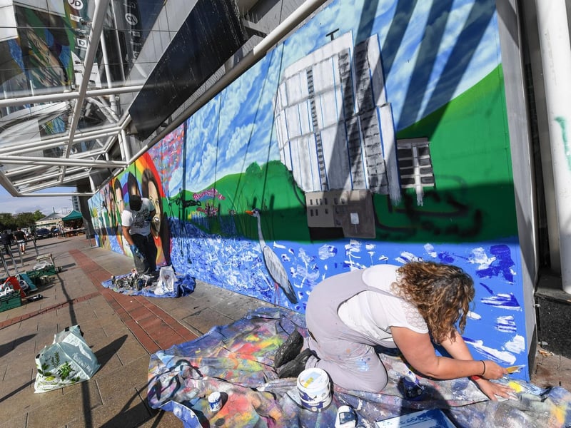 Mark and Anna creating the mural