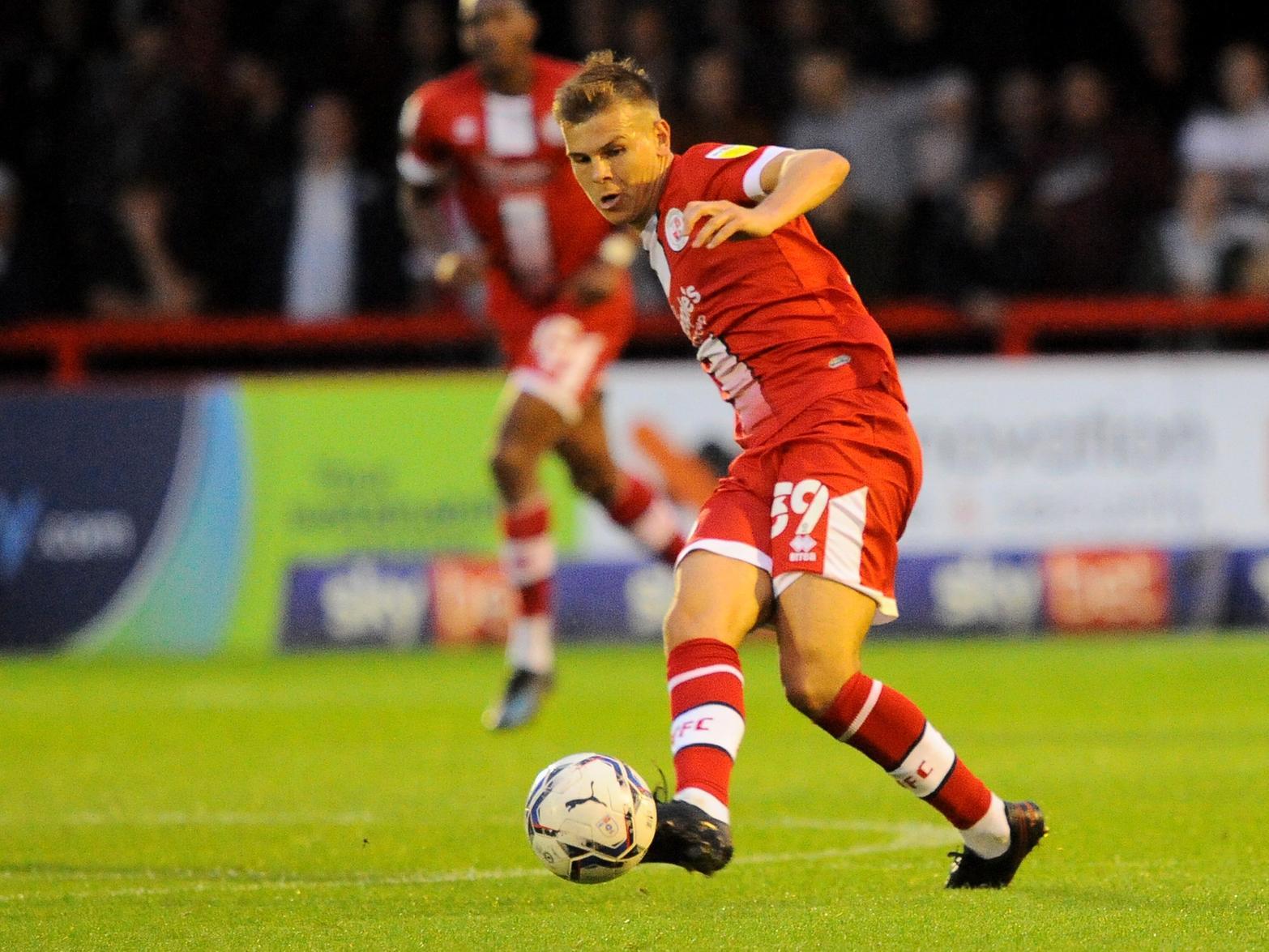 Jake Hessenthaler in action against Salford City