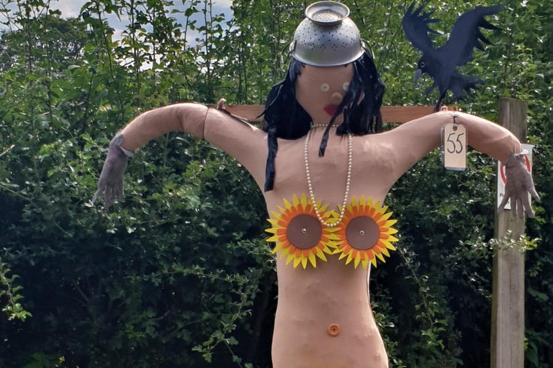 Chiddingly Scarecrow Trail. 2021. Colander Girl by Anne Mills for Chiddingly WI SUS-210819-090512001
