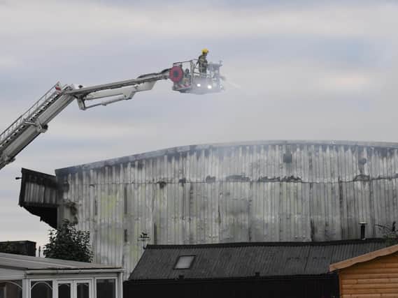 The aftermath at a warehouse fire at George H Kime and Co Ltd depot in Wrangle