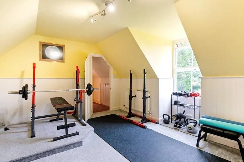 One of the bedrooms on the second floor is currently used as a gym. Picture: Savills - Haywards Heath.