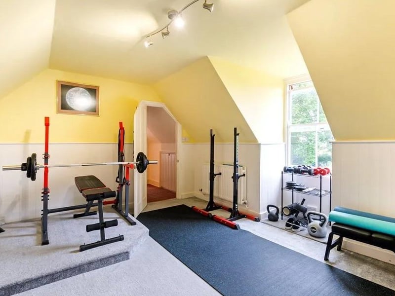 One of the bedrooms on the second floor is currently used as a gym. Picture: Savills - Haywards Heath.