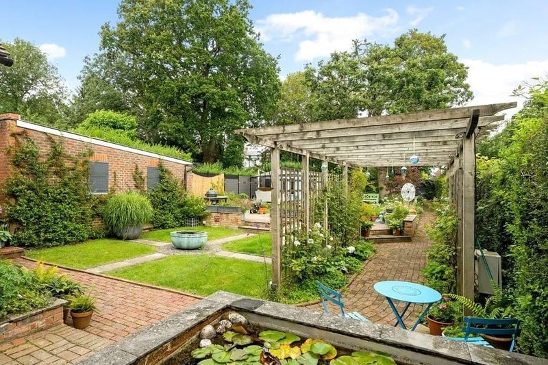 The rear garden is fully enclosed and has been beautifully landscaped. Picture: Savills - Haywards Heath.