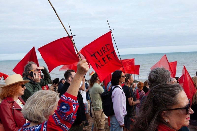 Protest against Southern Water on St Leonards seafront on August 20 following last month's sewage leak in Bulverhythe. Picture by Hastings and St Leonards Clean Water Action SUS-210821-121014001