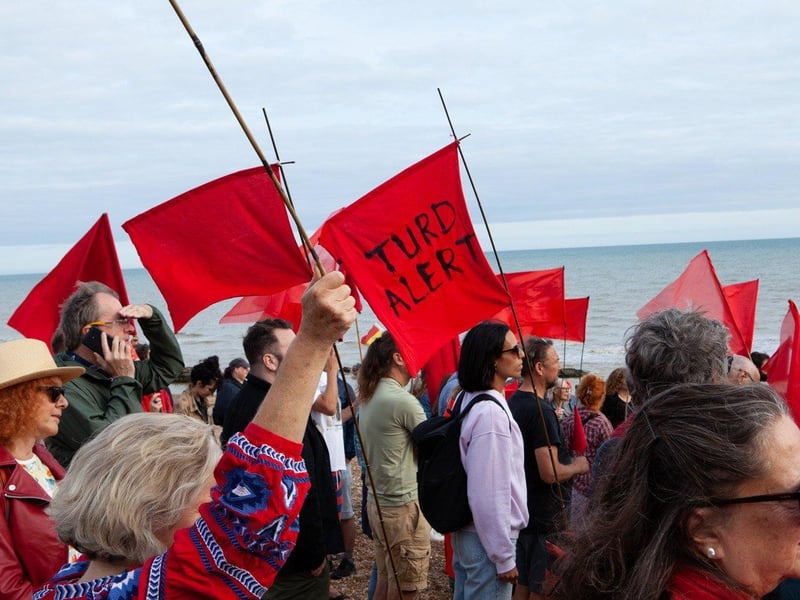 Protest against Southern Water on St Leonards seafront on August 20 following last month's sewage leak in Bulverhythe. Picture by Hastings and St Leonards Clean Water Action SUS-210821-121014001