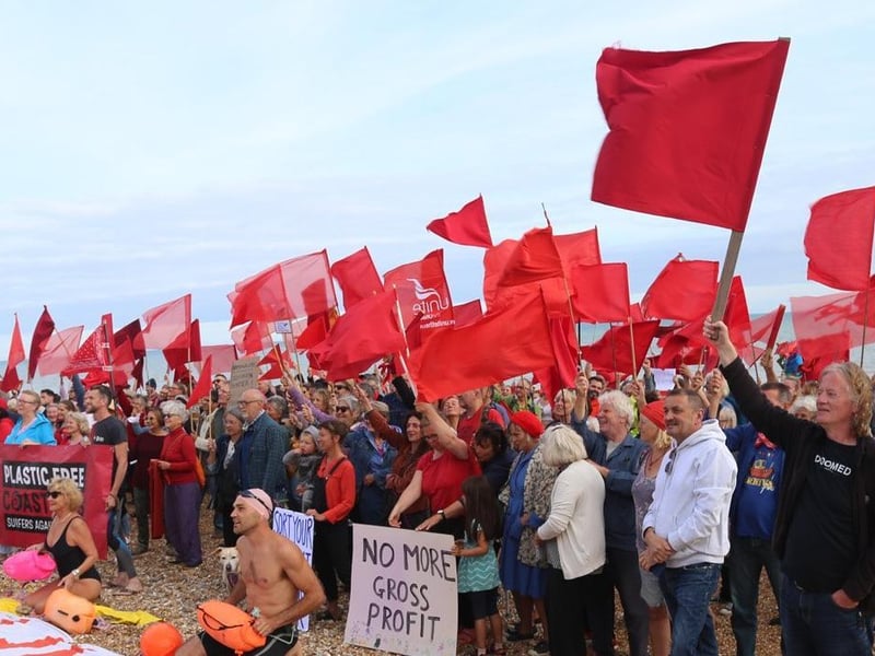 Protest against Southern Water on St Leonards seafront on August 20 following last month's sewage leak in Bulverhythe. Picture by Hastings and St Leonards Clean Water Action SUS-210821-120924001