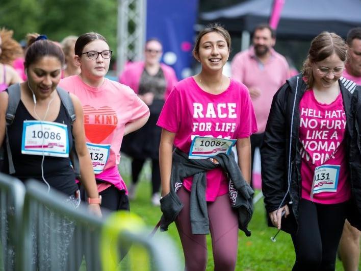Hundreds ran, jogged and walked around Abington Park on Saturday (August 21) to raise money for Cancer Research UK. Photo: Kirsty Edmonds.