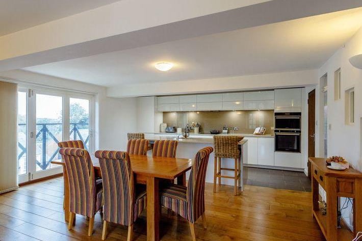 The open plan kitchen and dining area