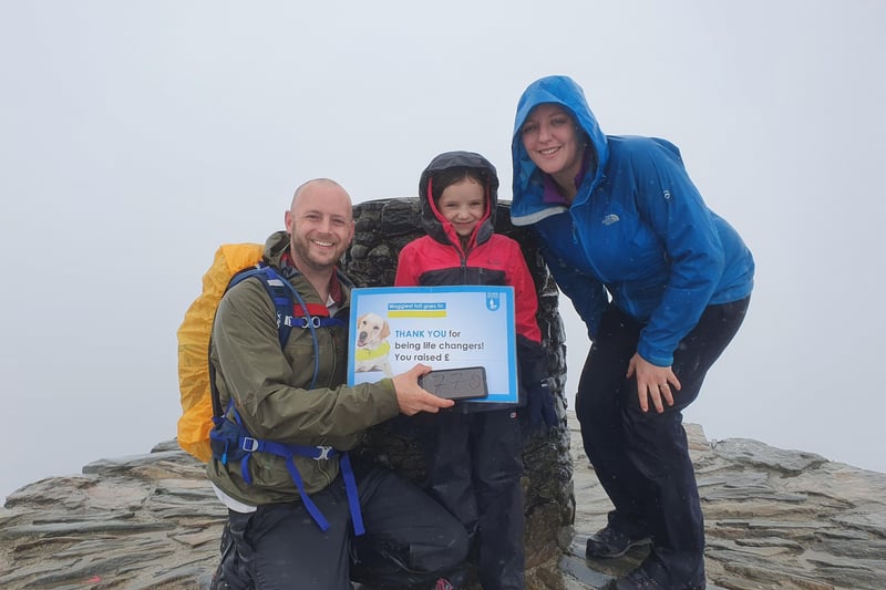 Despite the rain, Paige, her dad Mark, and her mum Samantha, reached the top of Mount Snowdon and raised £770 for the Guide Dogs charity