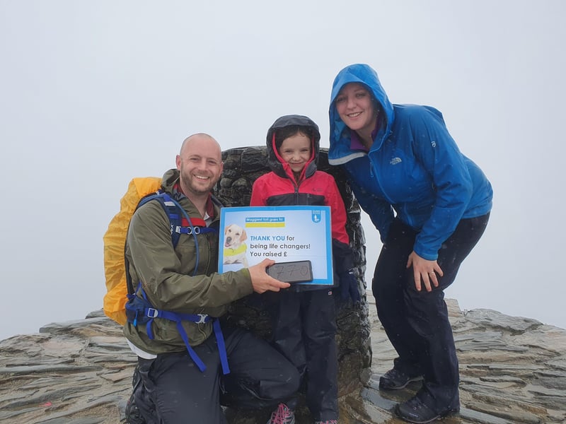 Despite the rain, Paige, her dad Mark, and her mum Samantha, reached the top of Mount Snowdon and raised £770 for the Guide Dogs charity