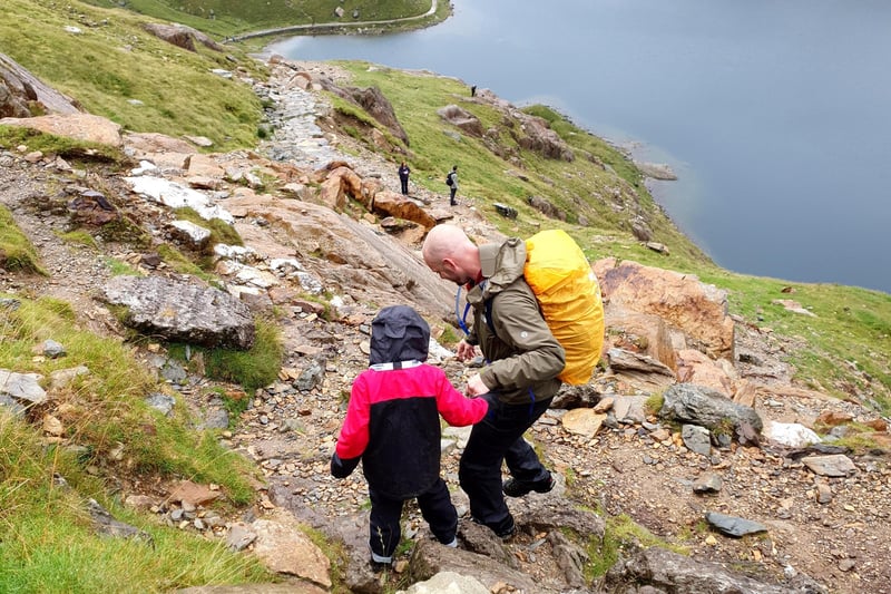 Paige and her dad, Mark, from Littlehampton,C climbing Mount Snowdon in Wales for the Guide Dog charity