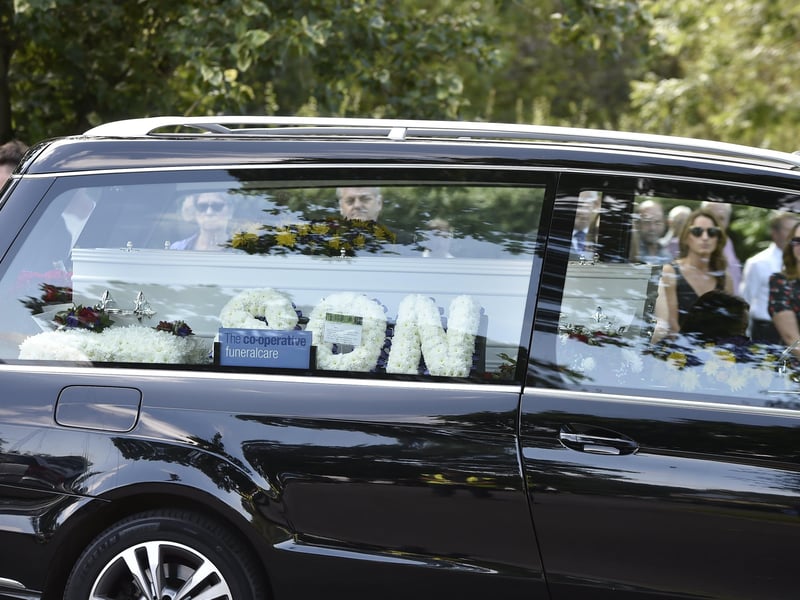 Mourners gather at Peterborough Crematorium.