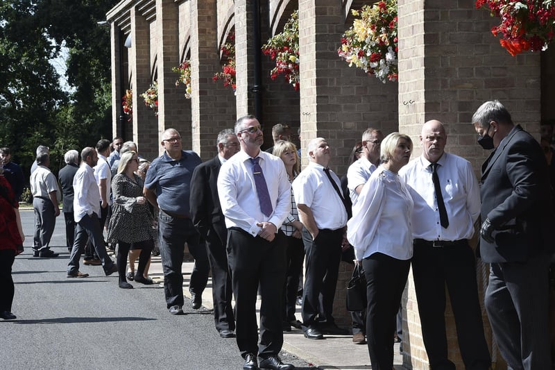 Mourners gather at Peterborough Crematorium.