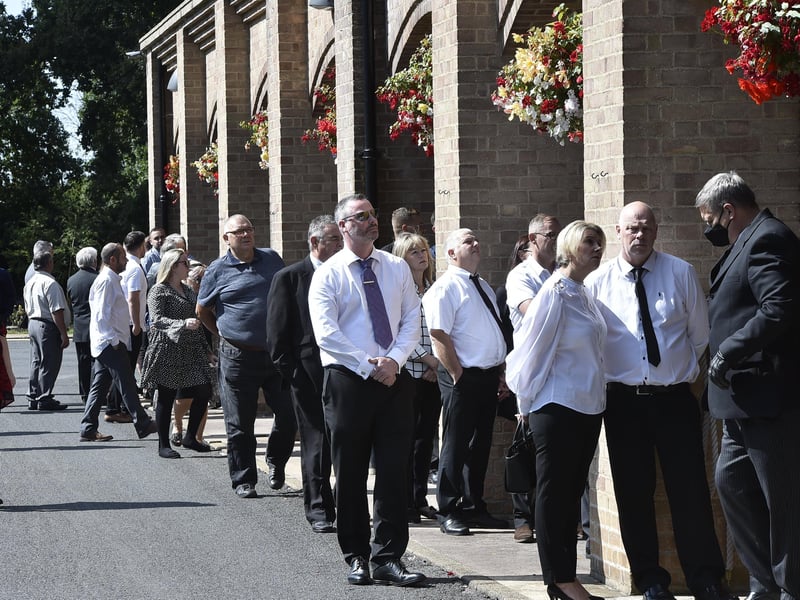 Mourners gather at Peterborough Crematorium.
