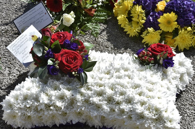 Floral tributes to Aaron Parker.