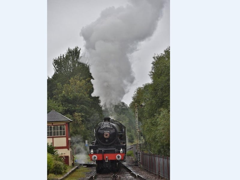Steam pours from The Bahamas as it enters Orton Mere station.