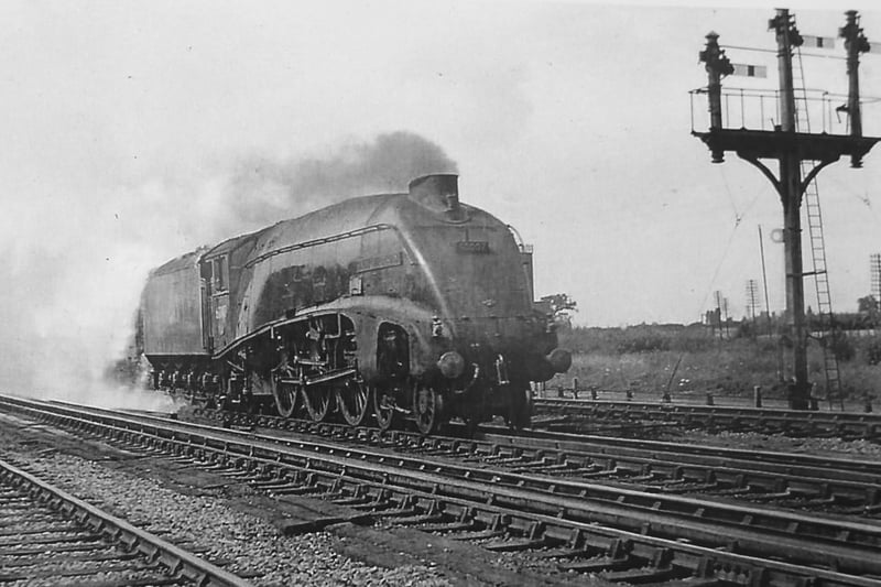 History of Railways in Peterborough exhibition  at Railworld.  Steam locomotive passing through Peterborough. Pic from the Nene Valley Railway Museum Group Archive EMN-210824-141542009