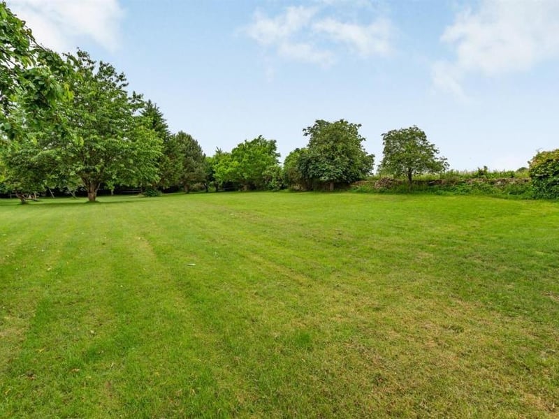 This detached, period, five-bed Northamptonshire home with separate Grade II listed barn is on the market.