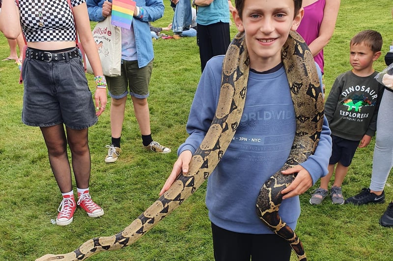 Oliver holds Xena the snake