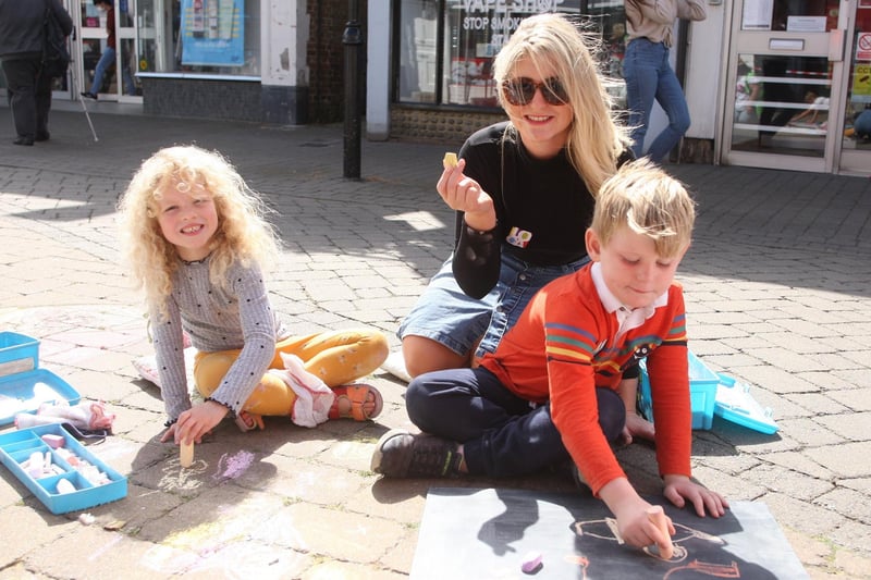 Poppy Golds and her children Bonnie, six and Jacob, six enjoying the chalk painting. Photo by Derek Martin Photography