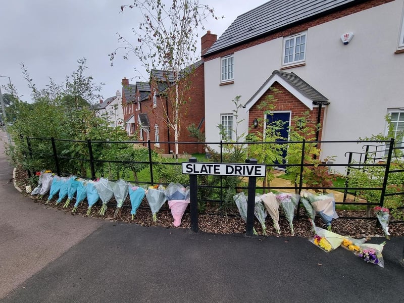 Flowers have been left at the scene in Slate Drive, Kettering.
