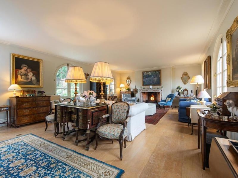This traditional style home has stunning gardens and overlooks the village church. On the market for 1.5 million.