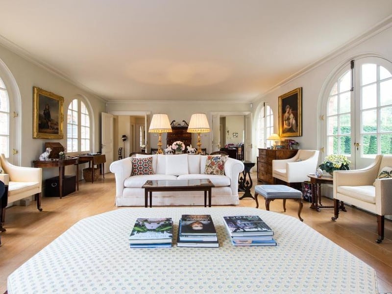This traditional style home has stunning gardens and overlooks the village church. On the market for 1.5 million.