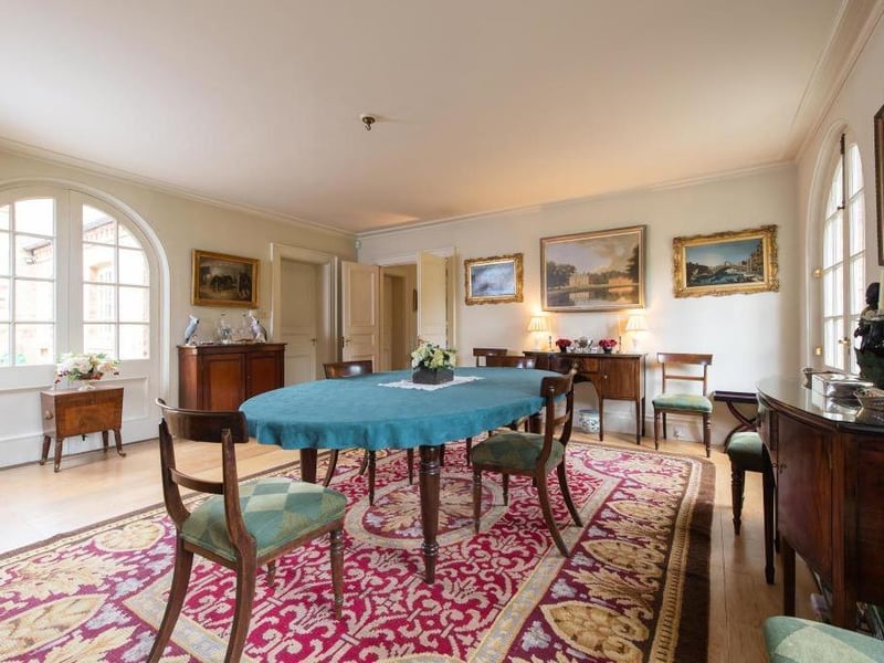 This traditional style home has stunning gardens and overlooks the village church. On the market for 1.5 million.