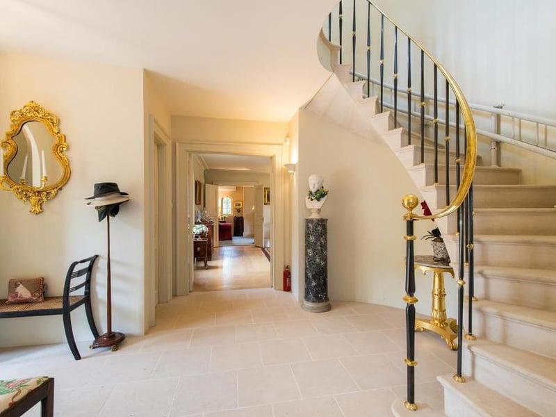 This traditional style home has stunning gardens and overlooks the village church. On the market for 1.5 million.