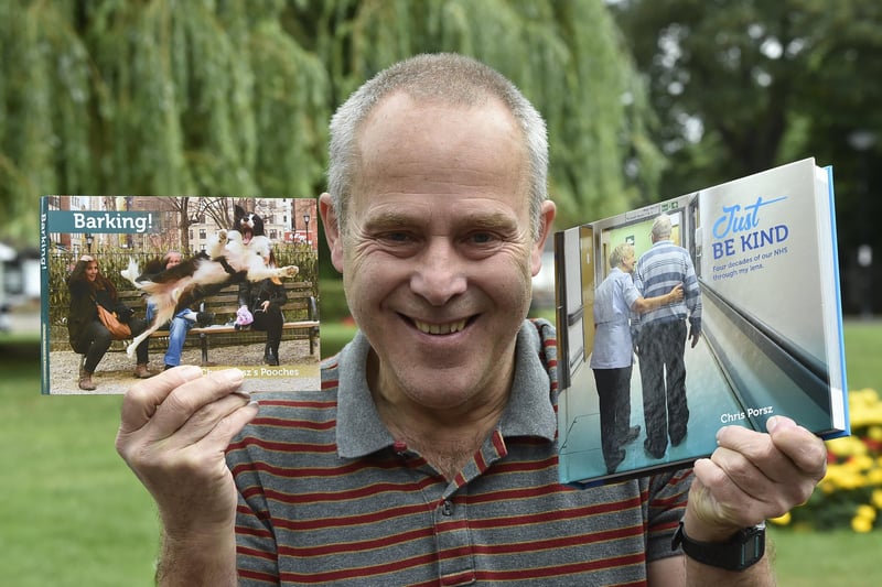 Well known Peterborough photographer Chris Porsz with his books EMN-210409-201448009