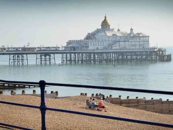 Eastbourne seafront was bathed in warm sunshine today as the mini heatwave hit our shores