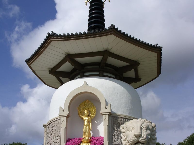 Four white lions guard the entrances of the Peace Pagoda
