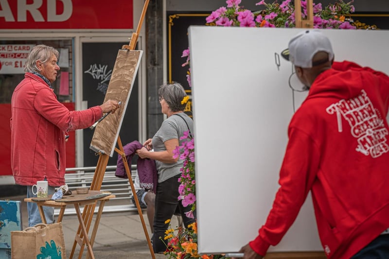 Artists set up their easels in the town centre 
Photo ©ABDigitalUK