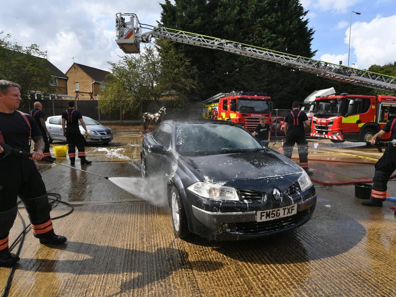 Stanground fire fighters and volunteers at their annual car wash at the Fire Station. Pictures: David Lowndes