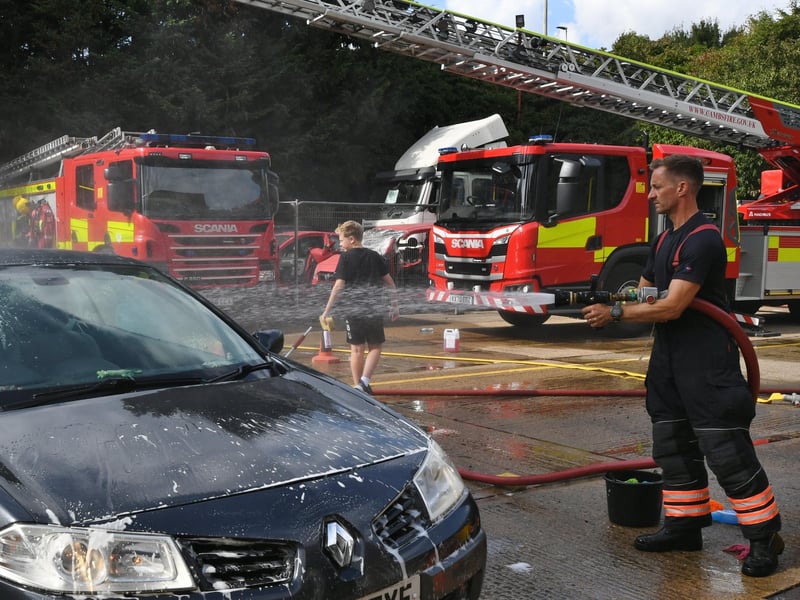 Stanground fire fighters and volunteers at their annual car wash at the Fire Station. Pictures: David Lowndes