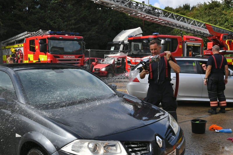 Stanground fire fighters and volunteers at their annual car wash at the Fire Station. Pictures: David Lowndes