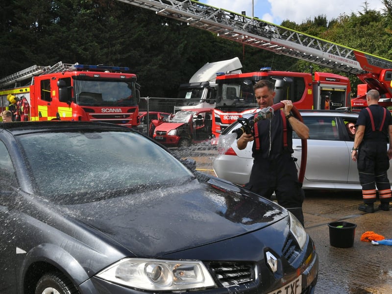 Stanground fire fighters and volunteers at their annual car wash at the Fire Station. Pictures: David Lowndes